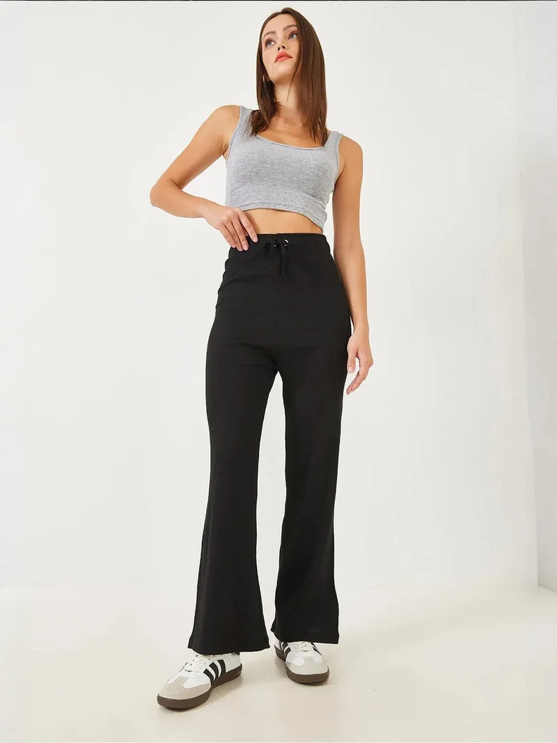 بيانكو لوتشي بنطلون واسع الساق من لوتشي بنقوش مع ربطة عنق