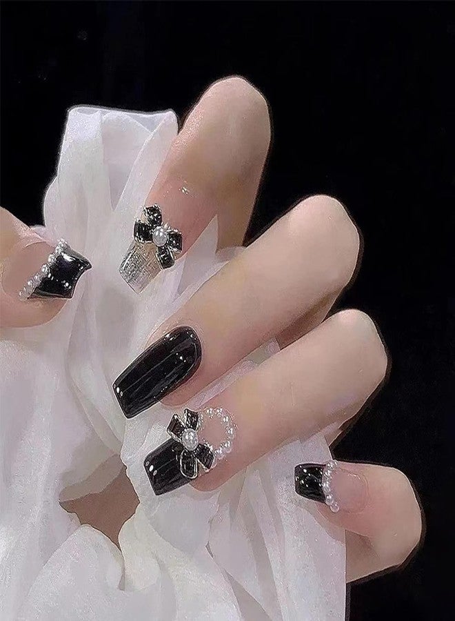 YKZFUI 24Pcs Press on Nails Medium Length Fake Nails with Black Bow Pearl Designs,Artificial Acrylic Full Cover Reusable Coffin False Nails, Women Glue on Nails Set,Stick on Nails for Nail Art - Image 1