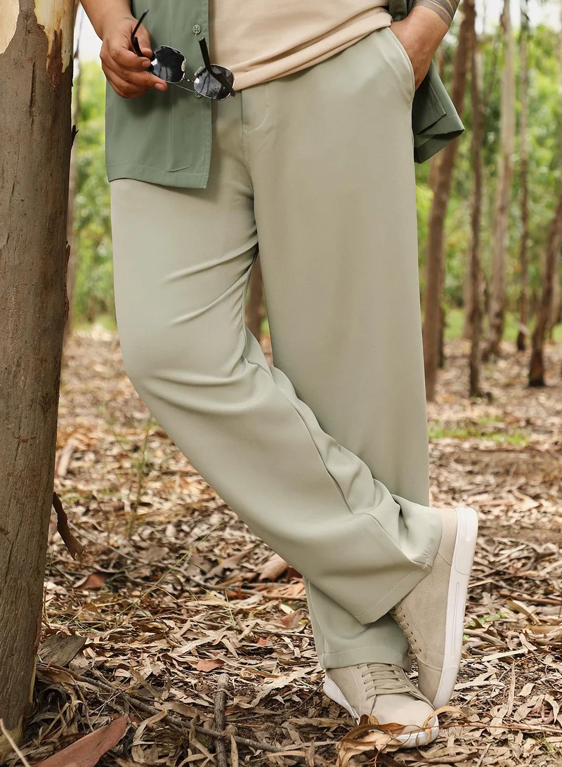انستافاب بلس Instafab Men's Light Pistachio Solid Relaxed-Chino Trousers | Mid Rise , Straight Hem , Drawcord & Button Closure | Solid Plain | Polyester Blend Trousers For Formal & Office Wear