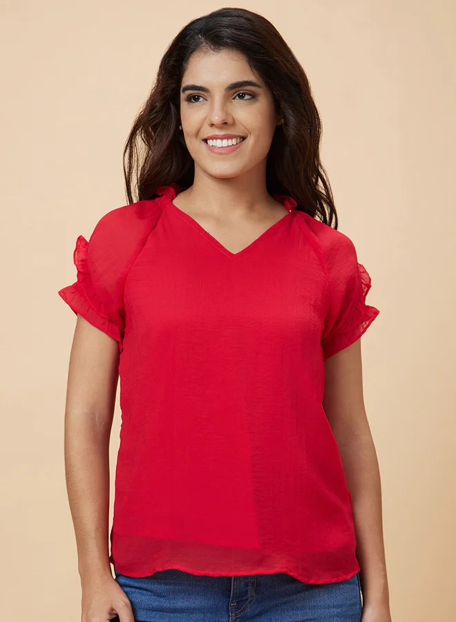 جلو باص بلوزة سادة بأكمام قصيرة