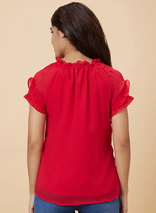 جلو باص بلوزة سادة بأكمام قصيرة