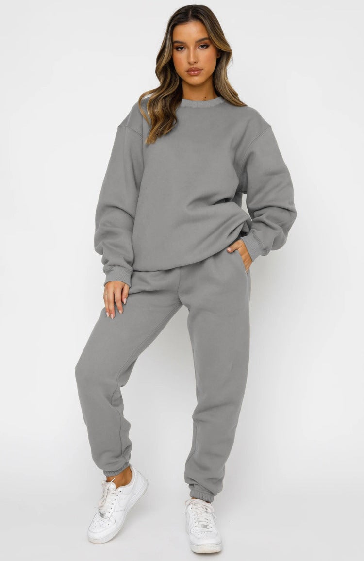 Nordic fashion spring and autumn womens clothing European and American casual slimming two-piece womens round neck long sleeve sweater fashion trousers two-piece set Gray