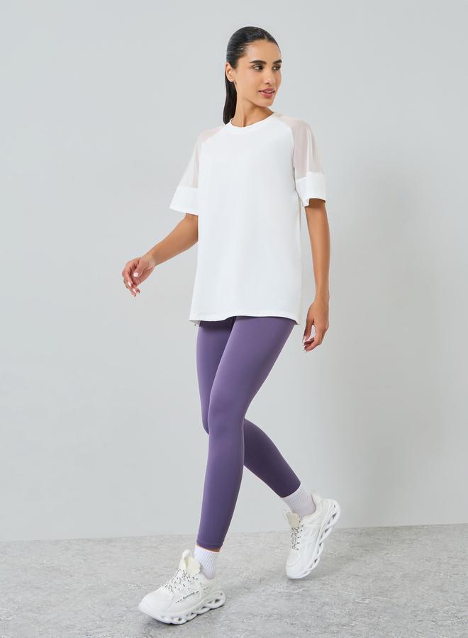 ستايلي اكتيف بلوزة بتفاصيل شبكية على الاكتاف - Image 2