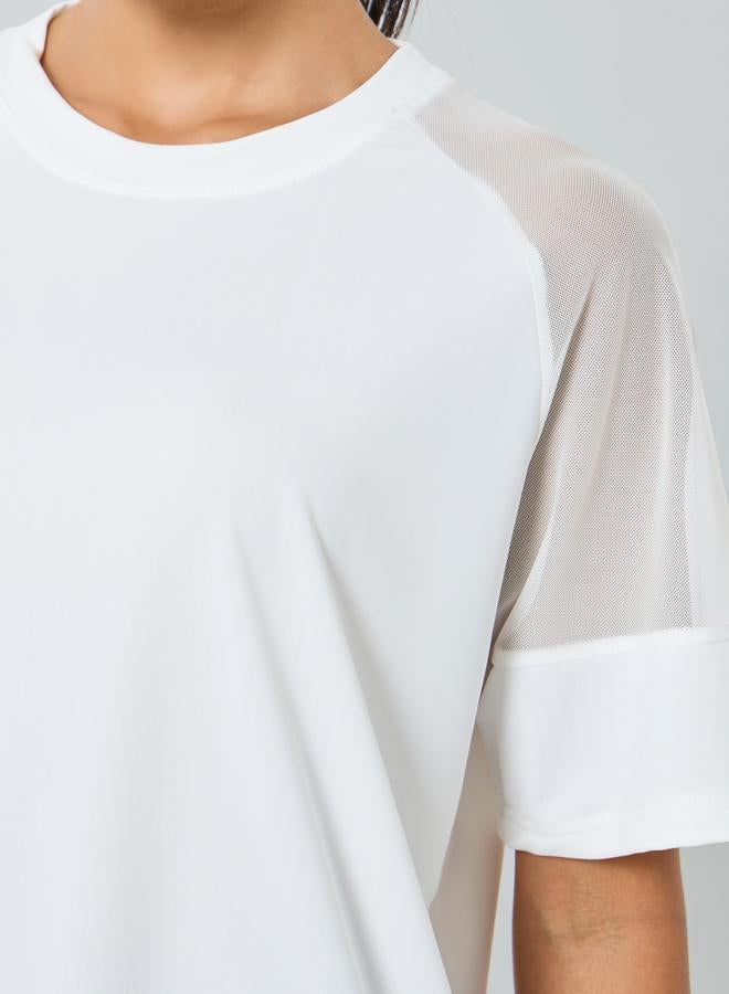 ستايلي اكتيف بلوزة بتفاصيل شبكية على الاكتاف - Image 3