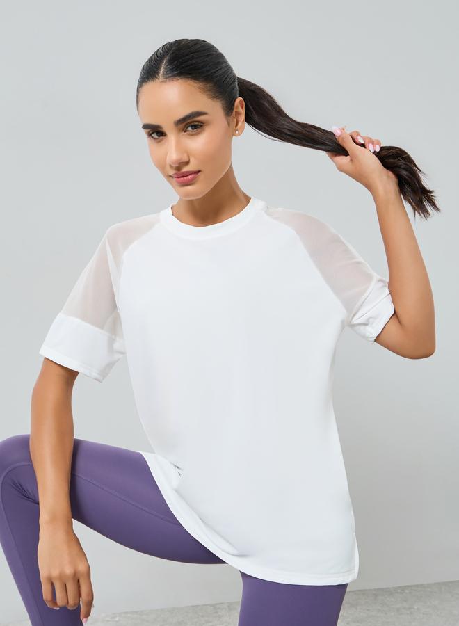 ستايلي اكتيف بلوزة بتفاصيل شبكية على الاكتاف - Image 1