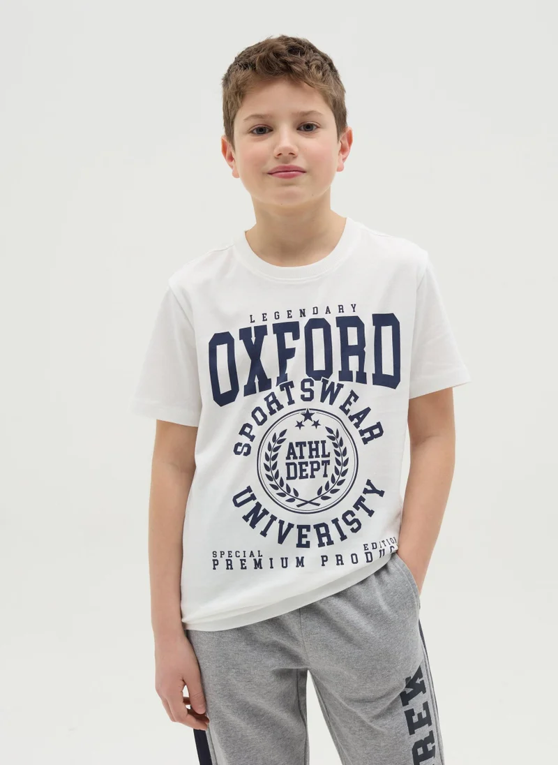 او في اس T-Shirt In Cotton With ''Sportswear University� Print