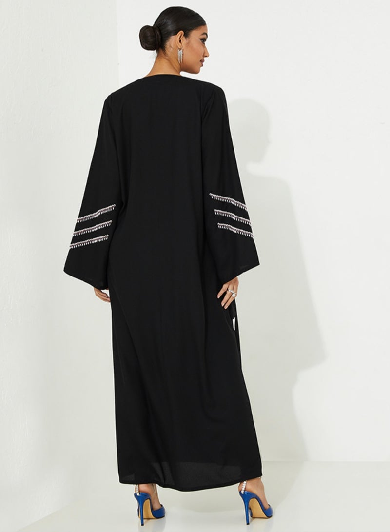 Rosette Abaya Embroidered Abaya with pearl purple design on Sleeves - Image 3