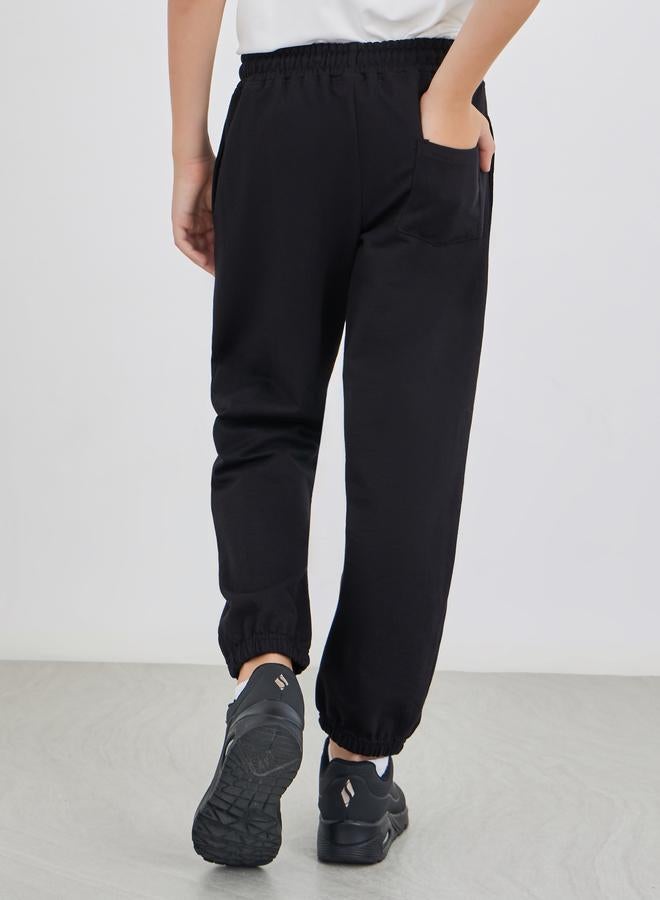 Styli Black Solid Cuffed Joggers With Slip Pockets - Image 4