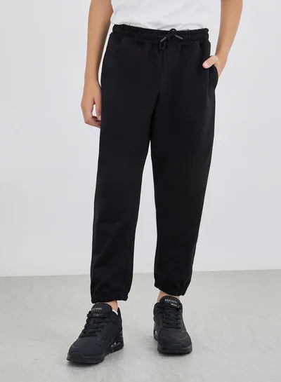 Styli Black Solid Cuffed Joggers with Slip Pockets