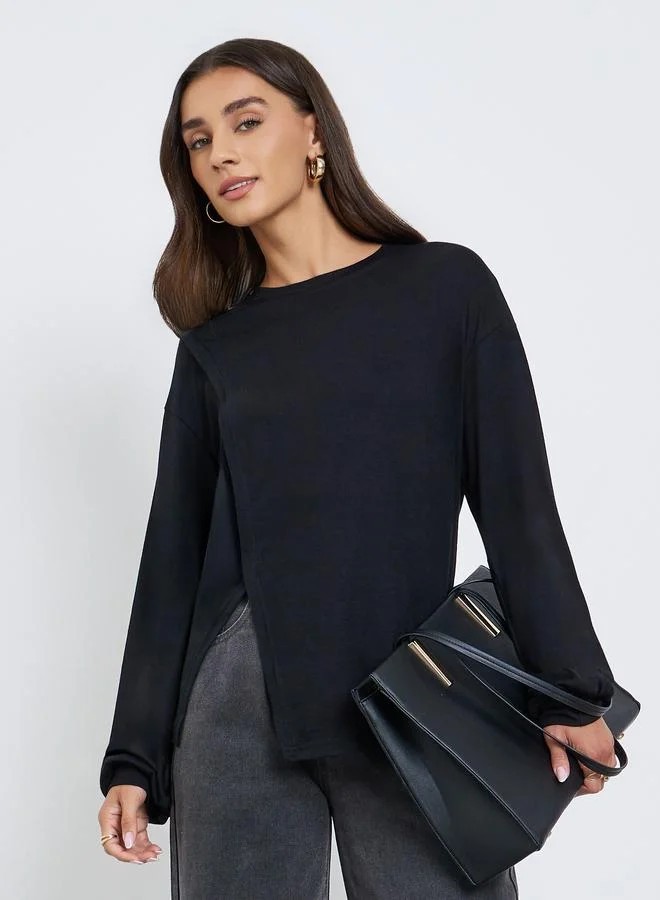 ستايلي تيشيرت واسع بأكمام طويلة وشق جانبي