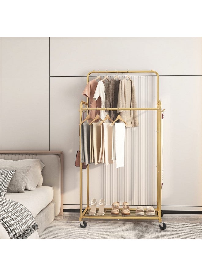 سيمبل تريدنج رف ملابس بسيط وعصري بقضيب مزدوج، رف ملابس متحرك عالي التحمل بعجلات لتعليق الملابس، مع 4 خطافات، ذهبي - Image 2