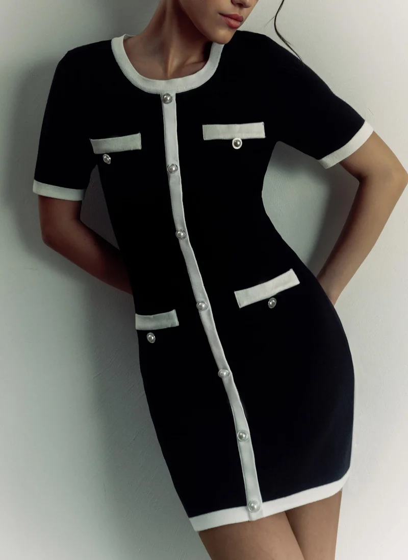 Lichi Jersey mini dress with contrasting details and buttons