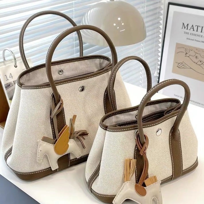 Top Layer Cowhide Stitching Canvas Garden Bag Large Capacity Commuter Shoulder Crossbody Portable Bucket Bag Fashion - Image 2
