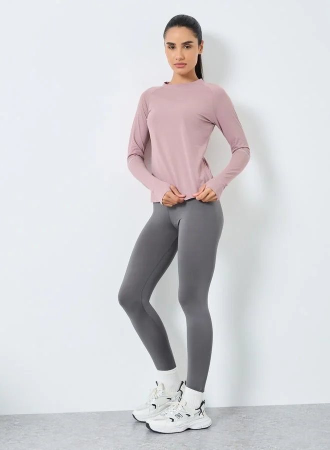 ستايلي اكتيف بلوزة ميلانج بتفاصيل عاكسة