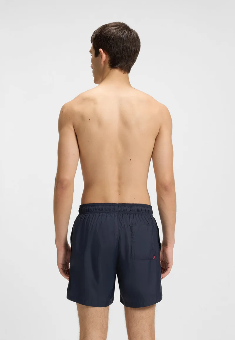 هوجو شورت سباحة مبطن بالكامل بشعار متباين