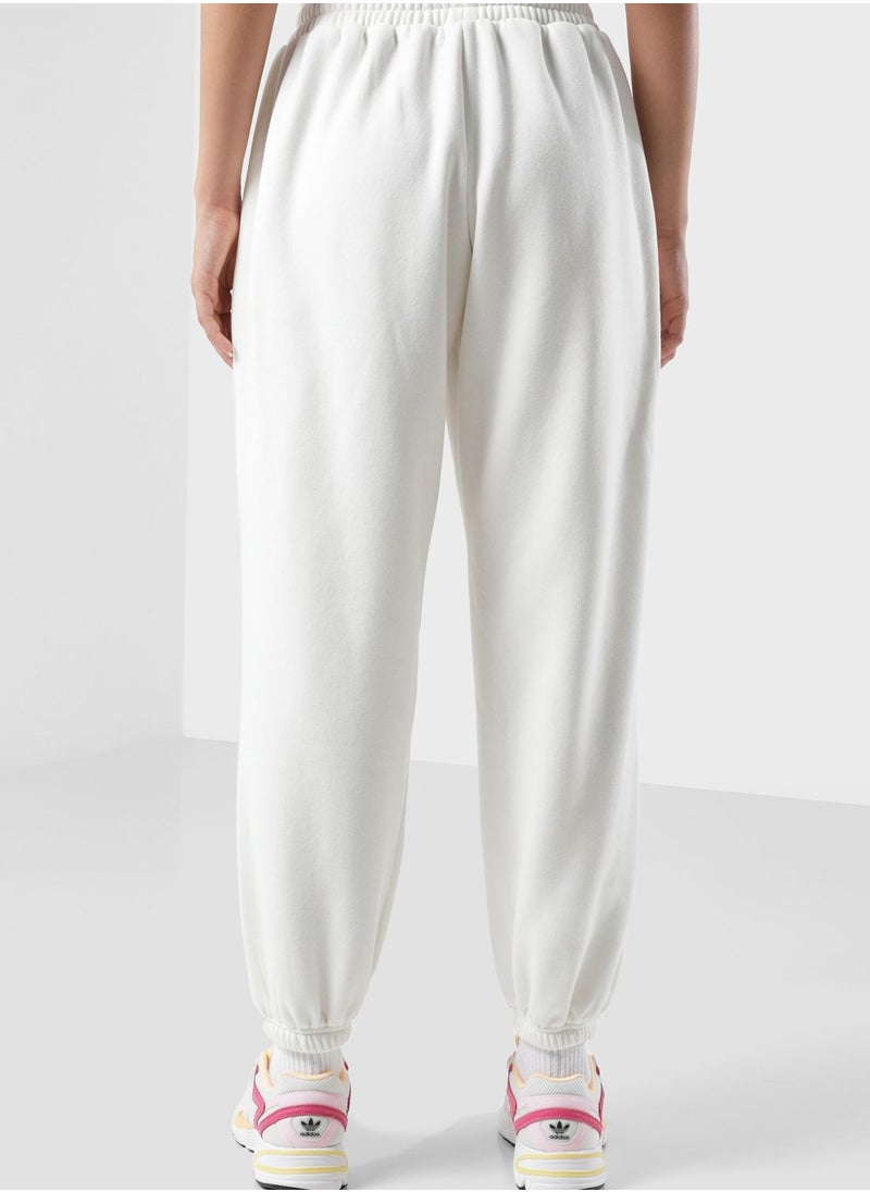 The Giving Movement - Oversized Racer Printed Joggers - Image 1