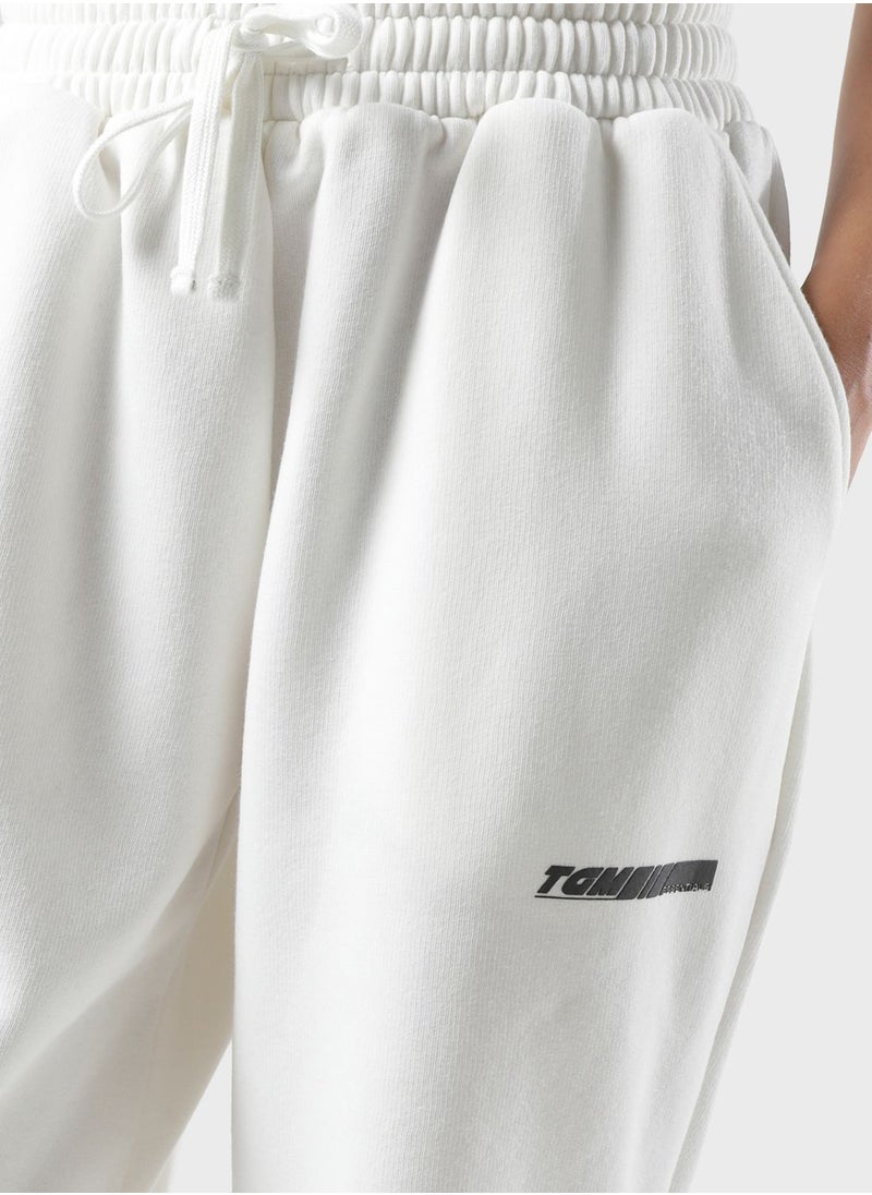 The Giving Movement - Oversized Racer Printed Joggers - Image 1
