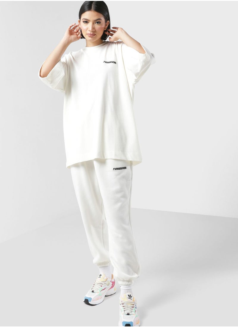 The Giving Movement - Oversized Racer Printed Joggers - Image 1