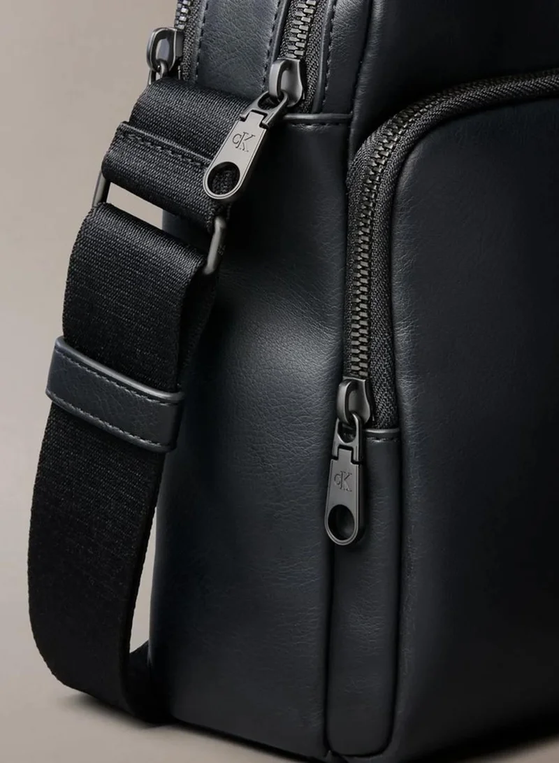 Calvin Klein Black Embossed Monogram Reporter Bag for Men | Best Price UAE