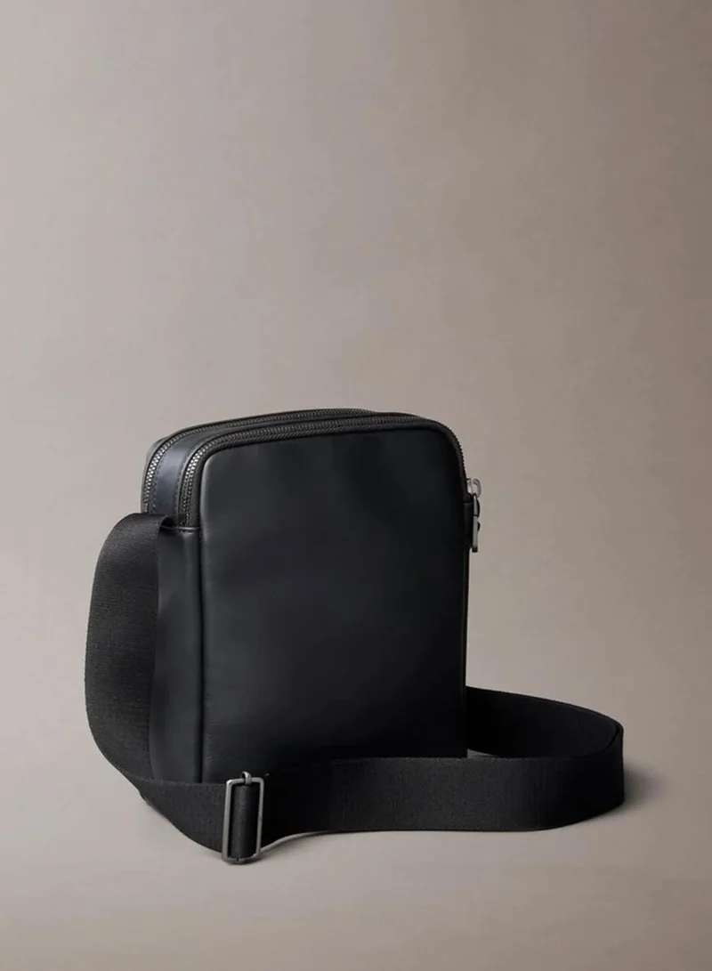 Calvin Klein Black Embossed Monogram Reporter Bag for Men | Best Price UAE