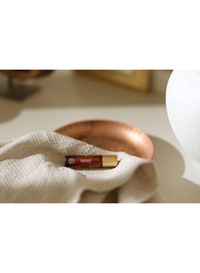 Young Living Thieves Roll-On - 10 ml - Pre-Diluted Essential Oil Blend for On-The-Go Application - a Legendary Blend of Essential Oils. Formulated with Clove, Lemon, Cinnamon Bark, Eucalyptus | Essential Oils, Roll-On, Legendary Blend, On-The-Go Application - Image 2
