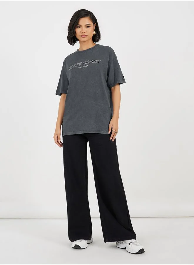 ستايلي Styli Acid Washed Oversized T-Shirt with Print Detail