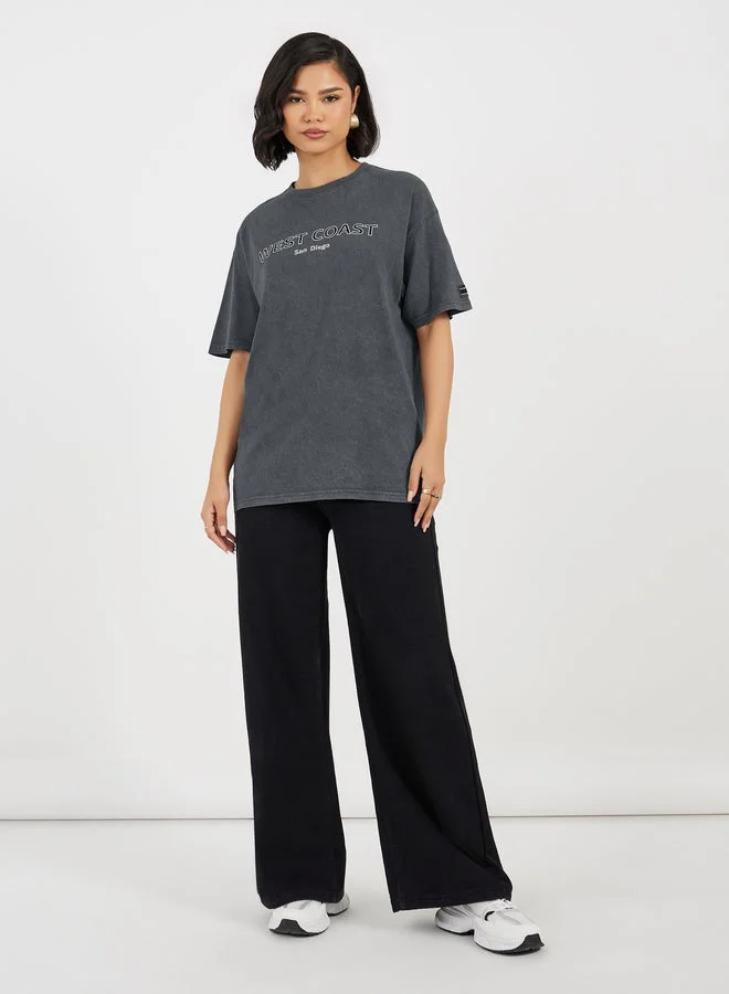 Styli Acid Washed Oversized T-Shirt With Print Detail