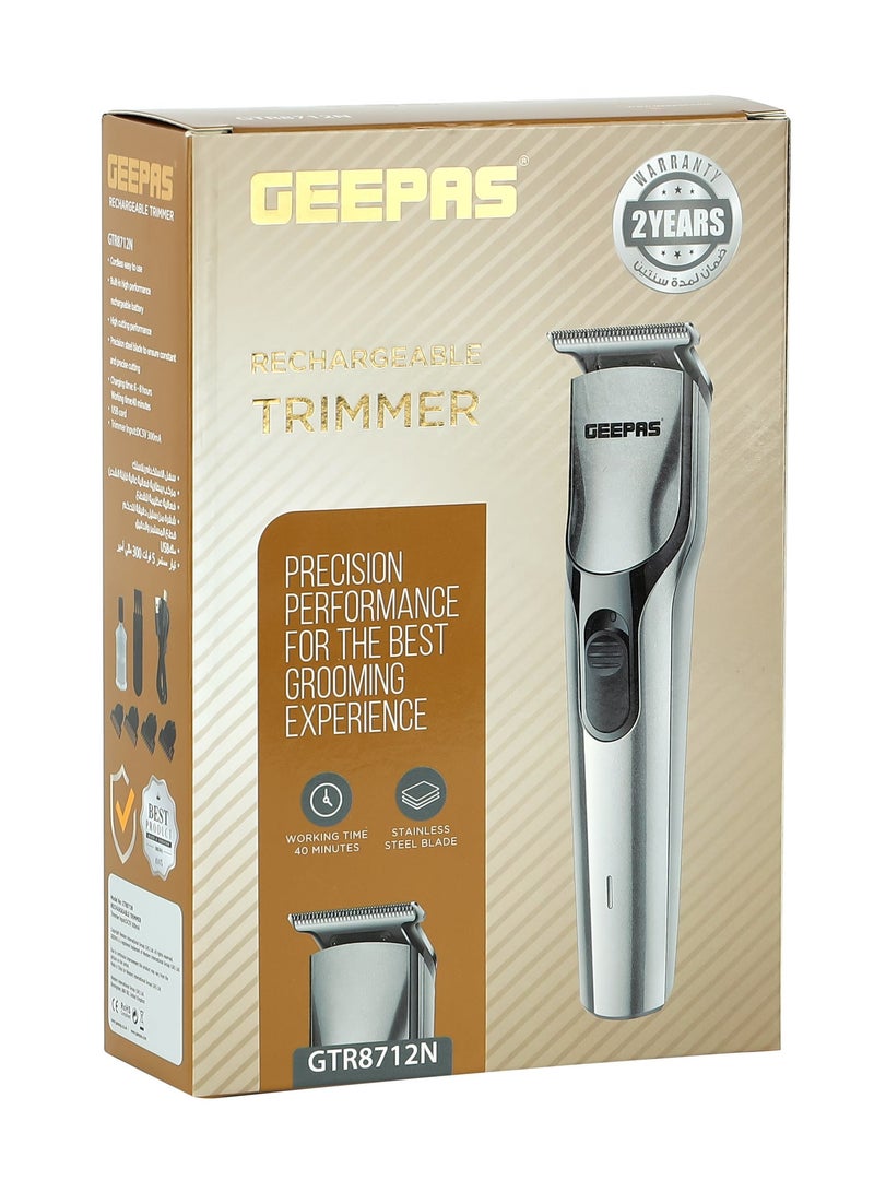 Geepas Rechargeable Hair Trimmer , Cordless Hair and Beard Trimmer with High Capacity Battery,Includes 4 Comb Attachments,Precision Stainless Steel Blade for Constant Cutting, Metallic Grey/Black - Image 1