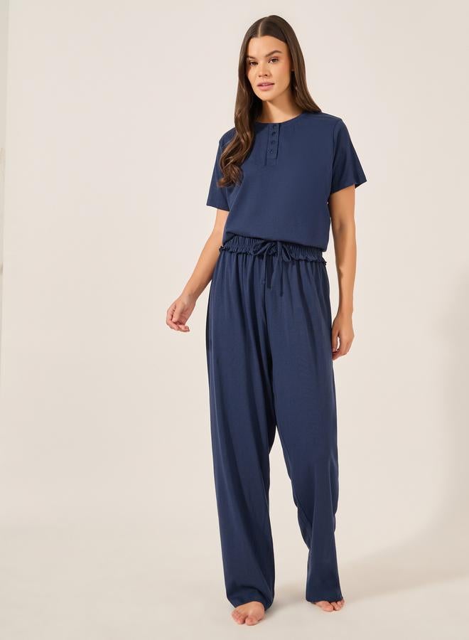 ستايلي طقم بيجامة نسائي أزرق كحلي بتيشيرت محبوك بياقة وأكمام مكشكشة - Image 2