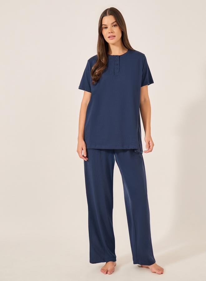 ستايلي طقم بيجامة نسائي أزرق كحلي بتيشيرت محبوك بياقة وأكمام مكشكشة - Image 1
