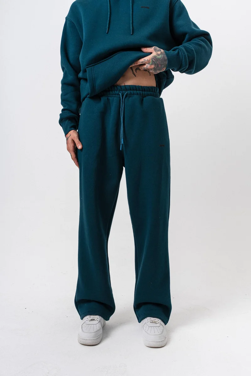 ريسباير بنطلون رياضي رجالي أساسي واسع (Baggy) بتفاصيل نص "Respire" لون زمردي