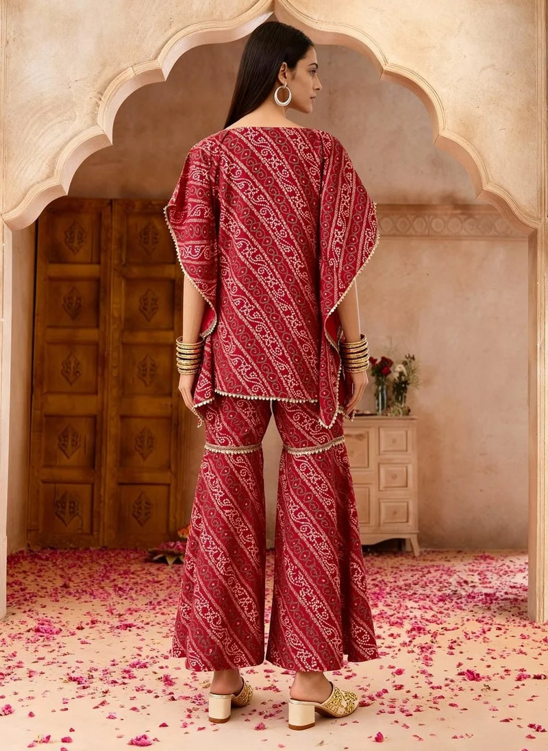 globus Globus Women Red Bandhani Ethnic Gold Foil Print V-Neck Kimono Sleeves Lace Detail Kaftan Tunic & Sharara Festive Co-Ord Set