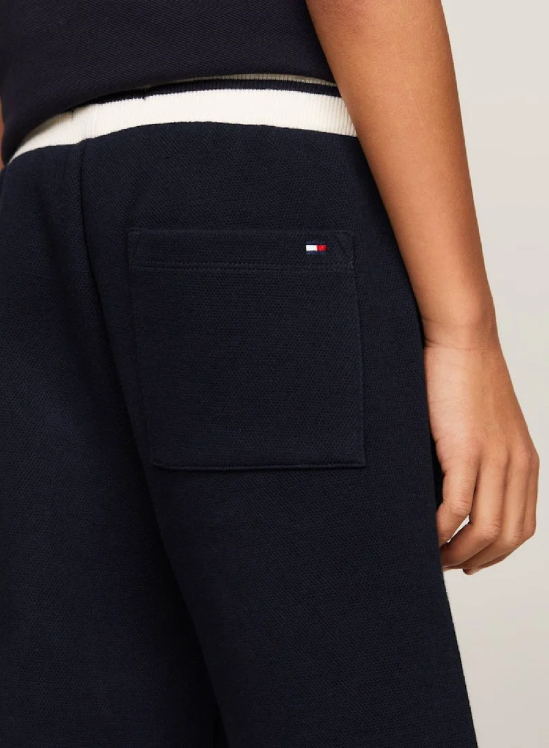 Tommy Hilfiger  Hilfiger Monotype Archive Crest Logo Sweat Shorts for Men | Best Price UAE