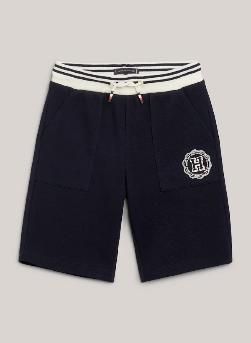Tommy Hilfiger  Hilfiger Monotype Archive Crest Logo Sweat Shorts for Men | Best Price UAE