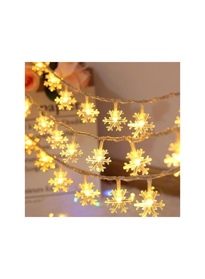 The Bros أضواء عيد الميلاد، 15م 150 ضوء على شكل ثلج، أضواء عيد الميلاد البيضاء الدافئة للزينة الداخلية والخارجية تعمل بالبطارية - Image 2