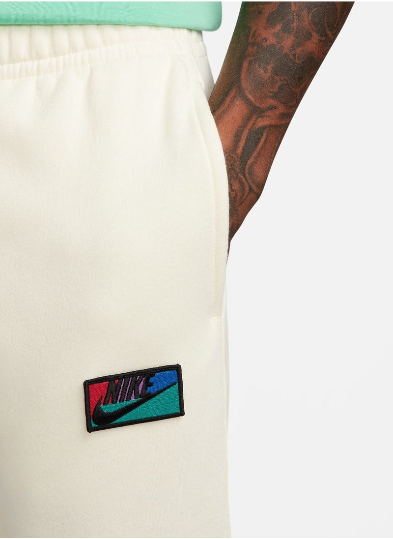 Nike - Club+ Patch Graphic Pants - Image 1