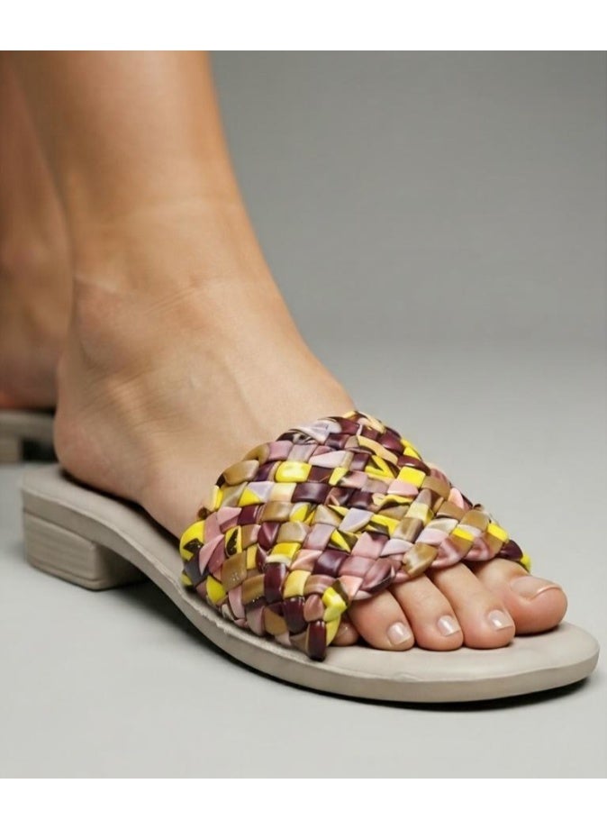 Stylish women's slippers with a braided and colorful design - Image 1