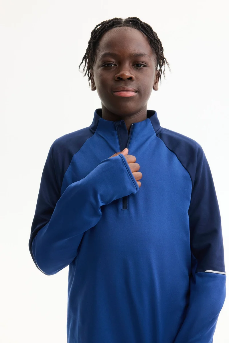 اتش اند ام بلوزة كرة قدم بتقنية ثيرمو موف™