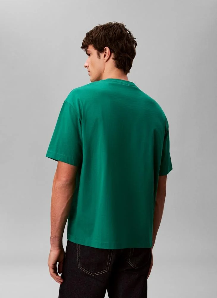 كالفن كلاين تيشيرت بياقة مستديرة بقصة مريحة وشعار