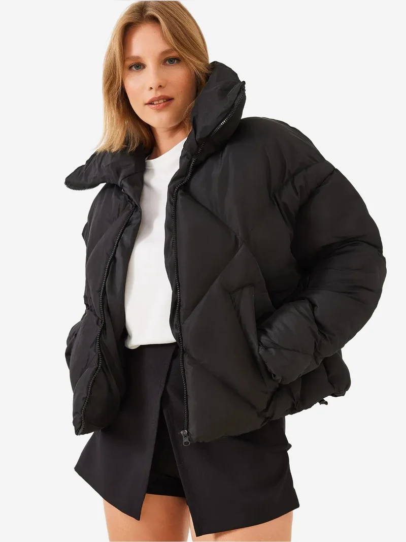 بيانكو لوتشي معطف منتفخ كبير الحجم من لوتشي