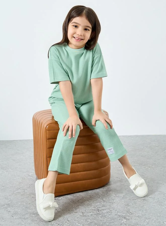 ستايلي طقم من بنطال جوغر وبلوزة محبوكة