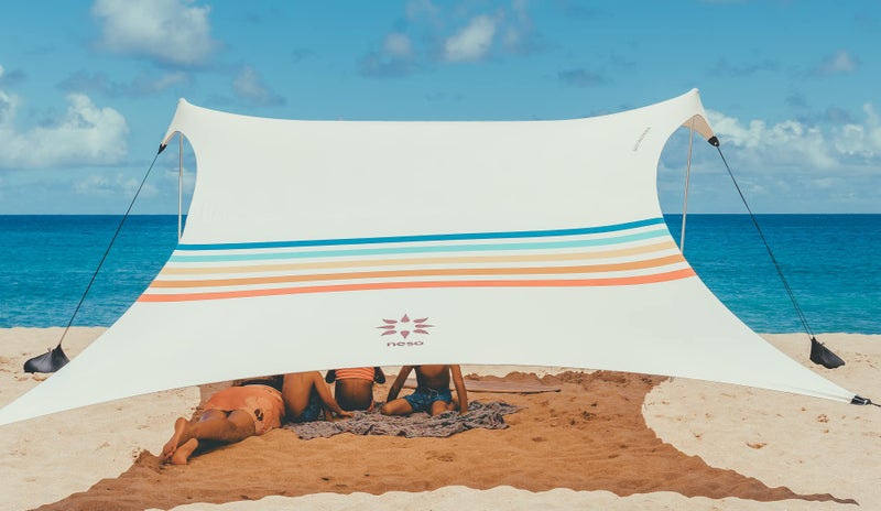 Neso Portable Beach Tent Sun Shelter with Sand Anchor - Lightweight Beach Shade Canopy - Easy Setup for Family Outings - Patented Reinforced Corners - UPF 50+ Sun Protection - 7 x 7ft - Rainbow - Image 1