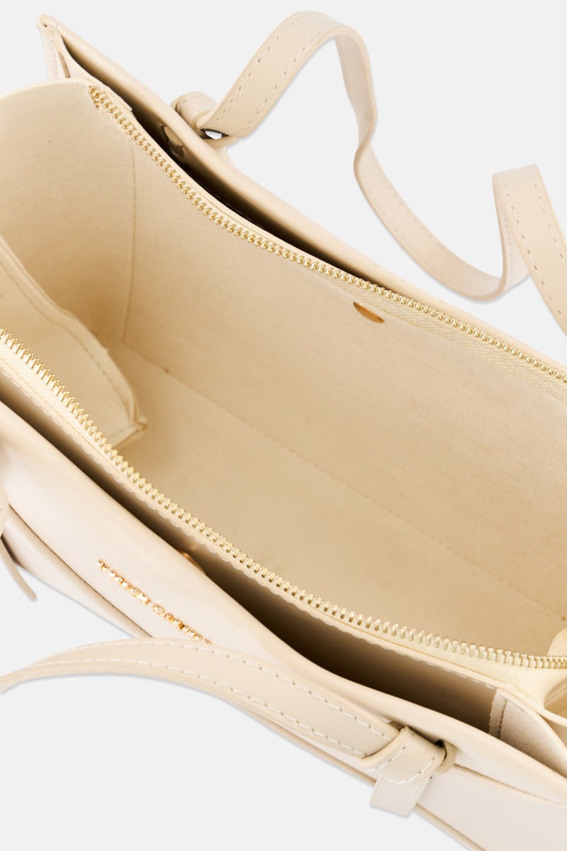 VINCE CAMUTO حقيبة كتف بشعار العلامة التجارية للنساء، كريمي - Image 3