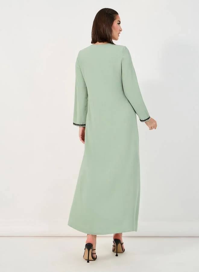 Styli Pintuck Detail Jalabiya with Tassel Trim