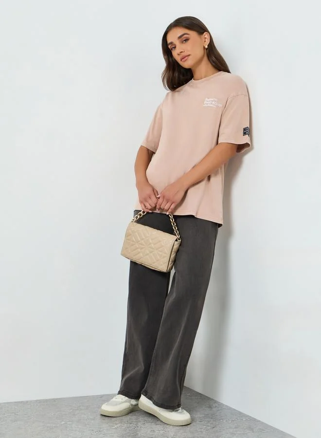 Styli Women Beige Slogan Oversized T-Shirt
