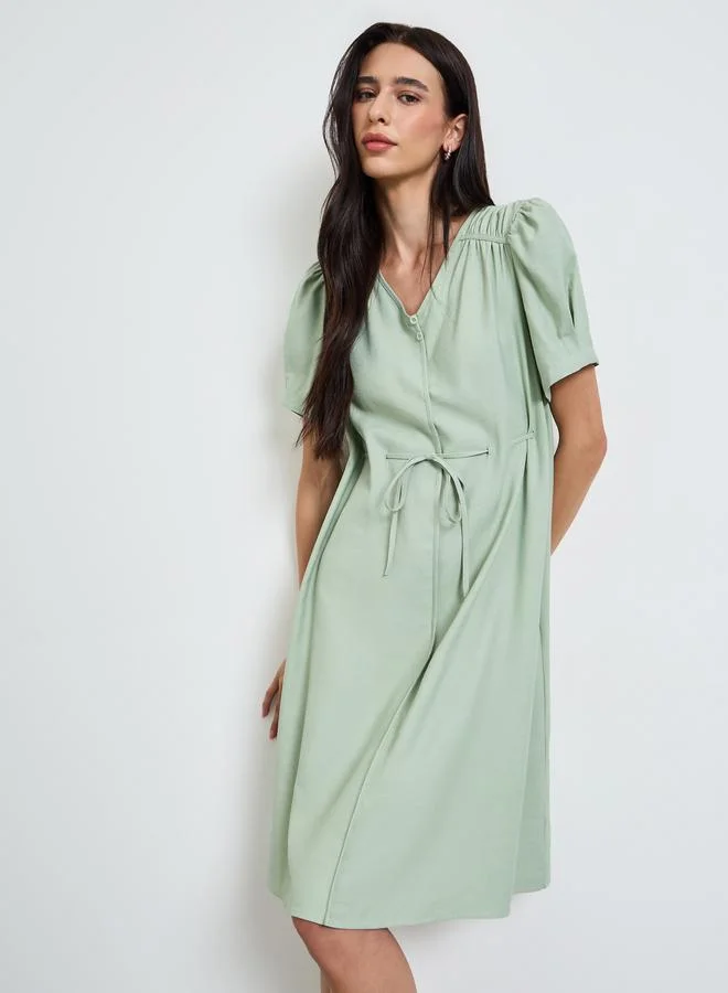ستايلي Green Solid Knee Length Dress with Drawstring