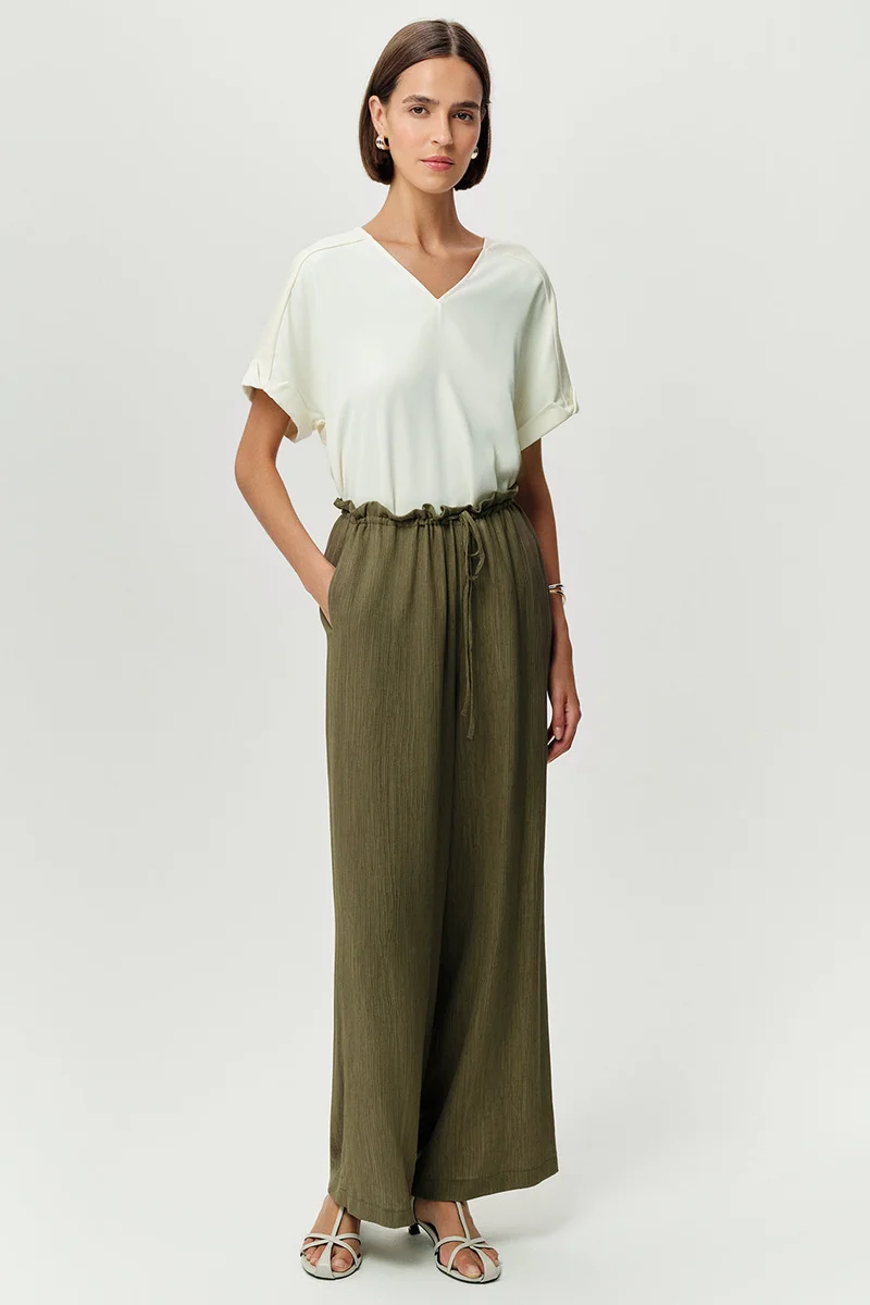 EXQUISE Wide-leg, regular woven khaki trousers with drawstring waist and pockets.