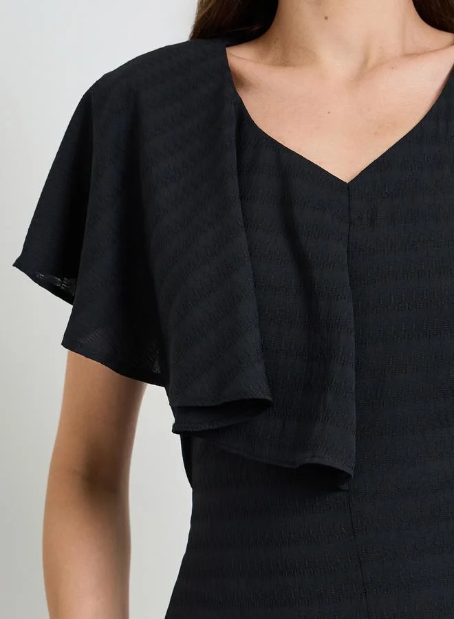 Maxim Creation black Black Textured Knee Length Dress with Frill Detail for Women | Best Price UAE