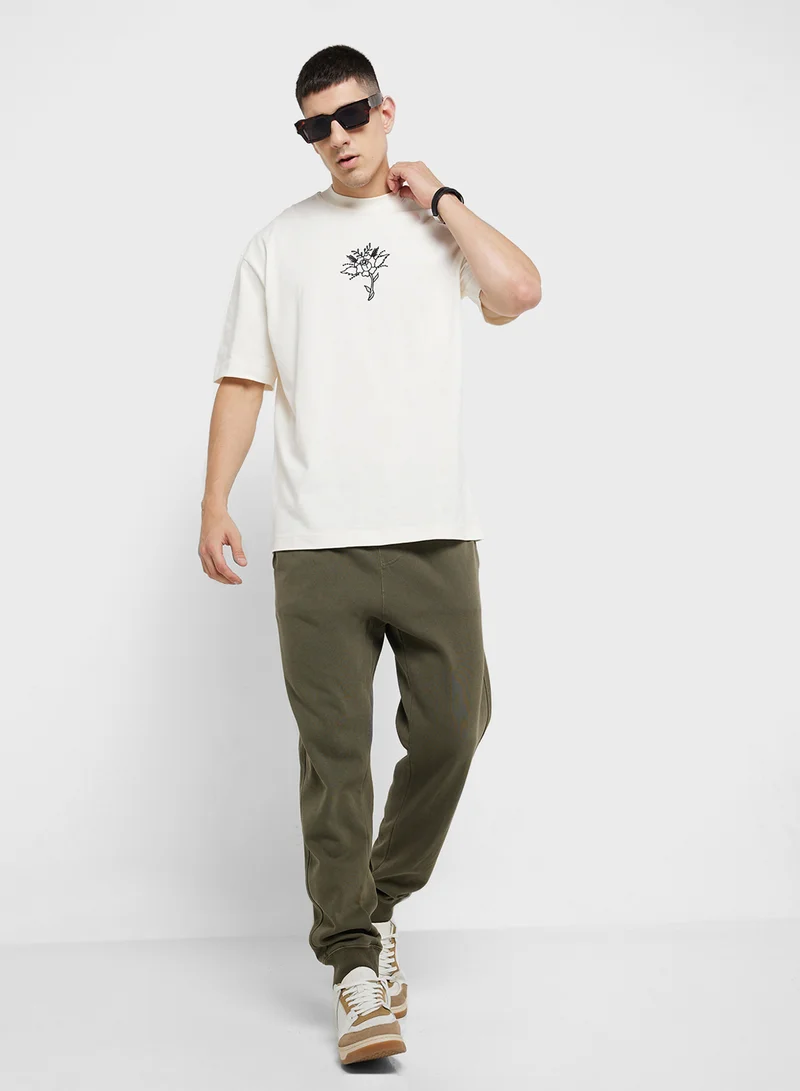 توب مان Embroidered Floral Tatto Oversized T-Shirt