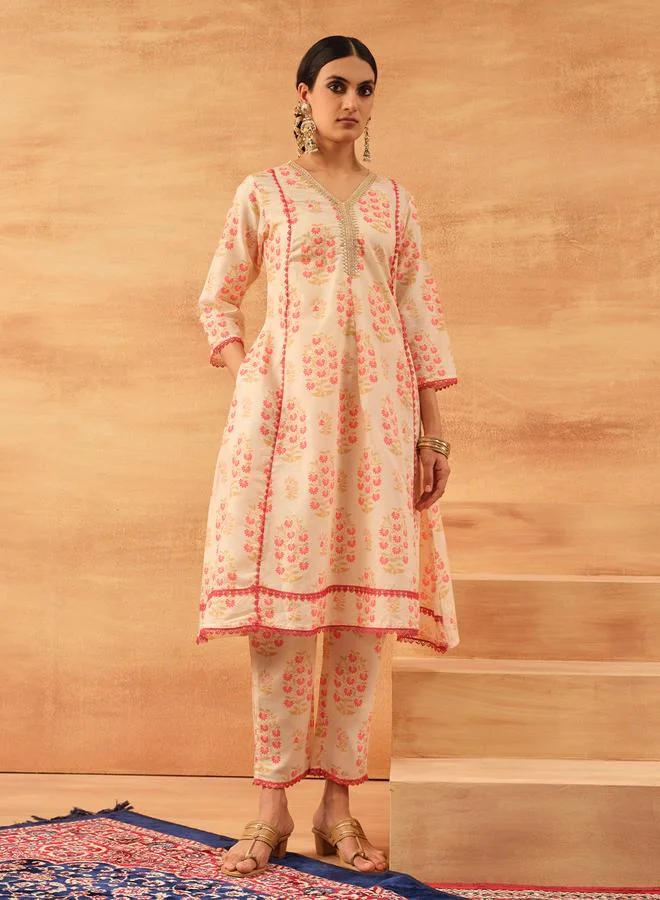 ISHIN Women's White Cotton Cambric Printed Tunic Top With Ankle Palazzo Flared 2 Peice Kurta Set